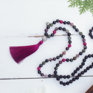 Mala Beads Necklace on a wooden table