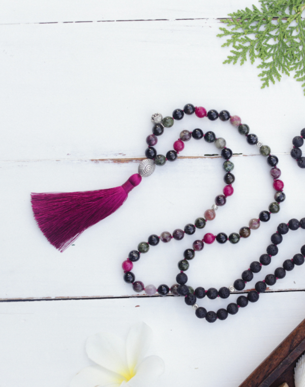 Mala Beads Necklace on a wooden table