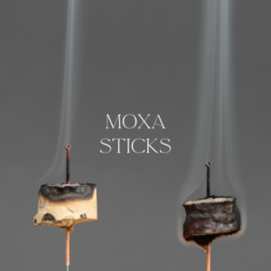 Moxa Sticks burning in a traditional chinese moxabustion session