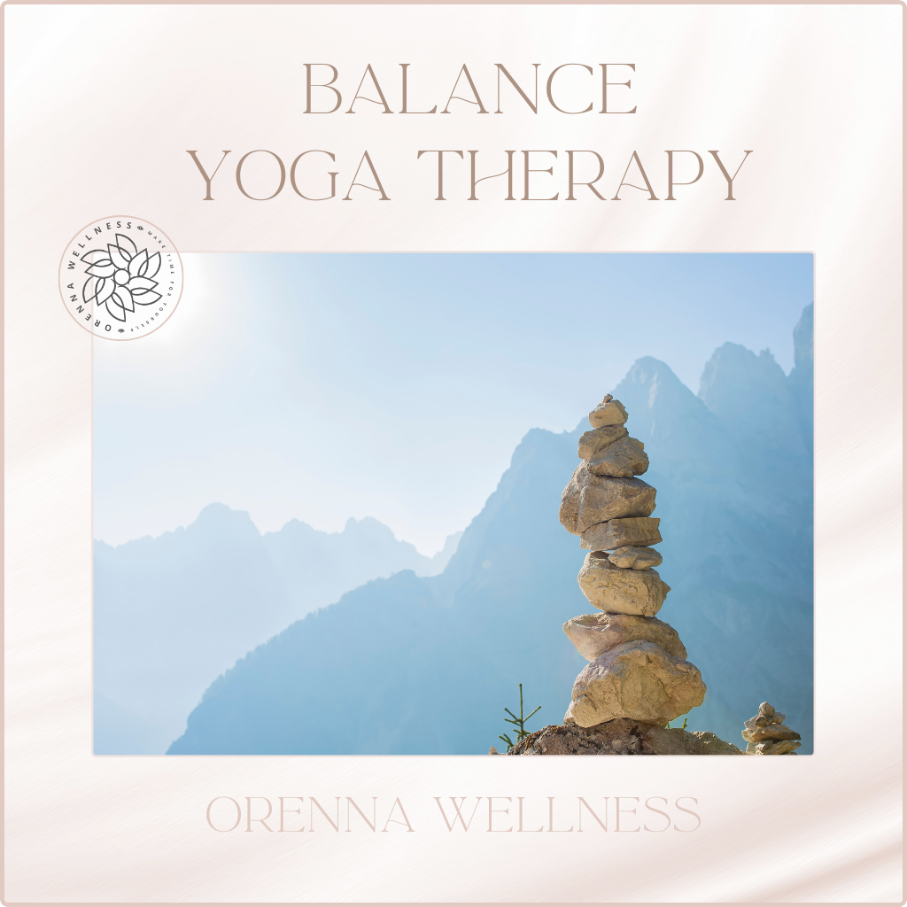 Yoga for Balance a pile of rocks balancing against a background of wild mountains by orenna wellness