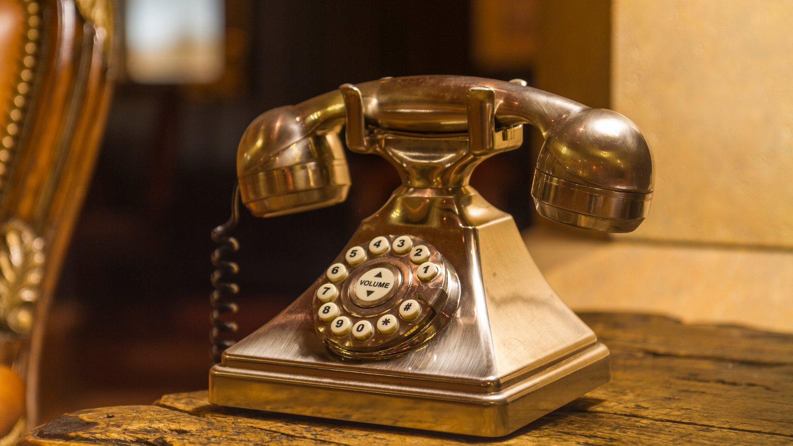 contact us old gold brown telephone